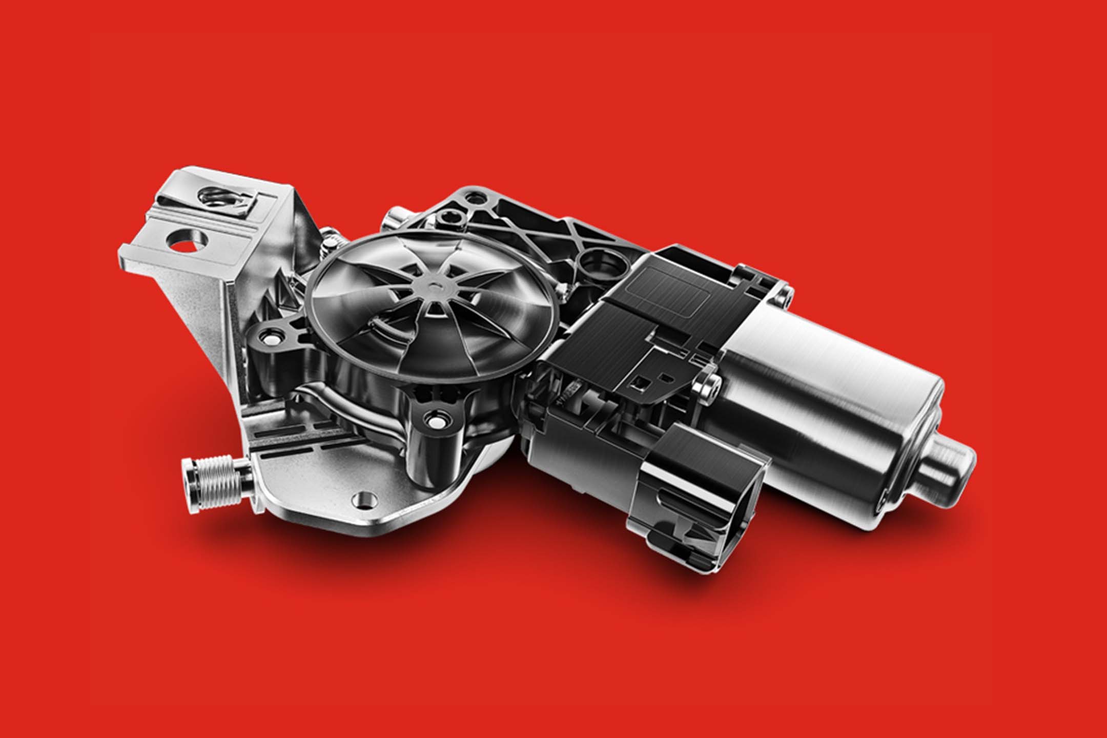 Motorcraft window lift motor on a red background